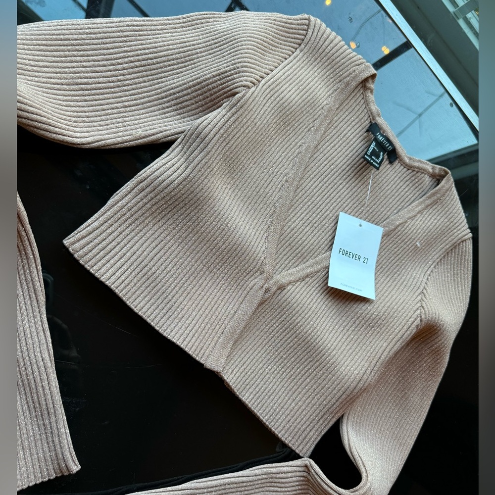 Cute top. New w/tag.